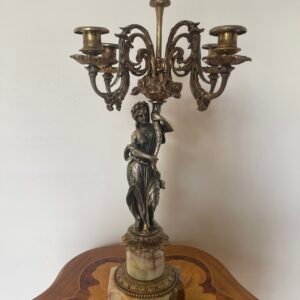 Candelabro a cinque fiamme con figura femminile in stile classico