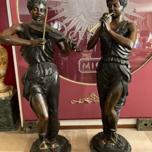 Maestosa Coppia di Sculture "Musi" in Bronzo Patinato